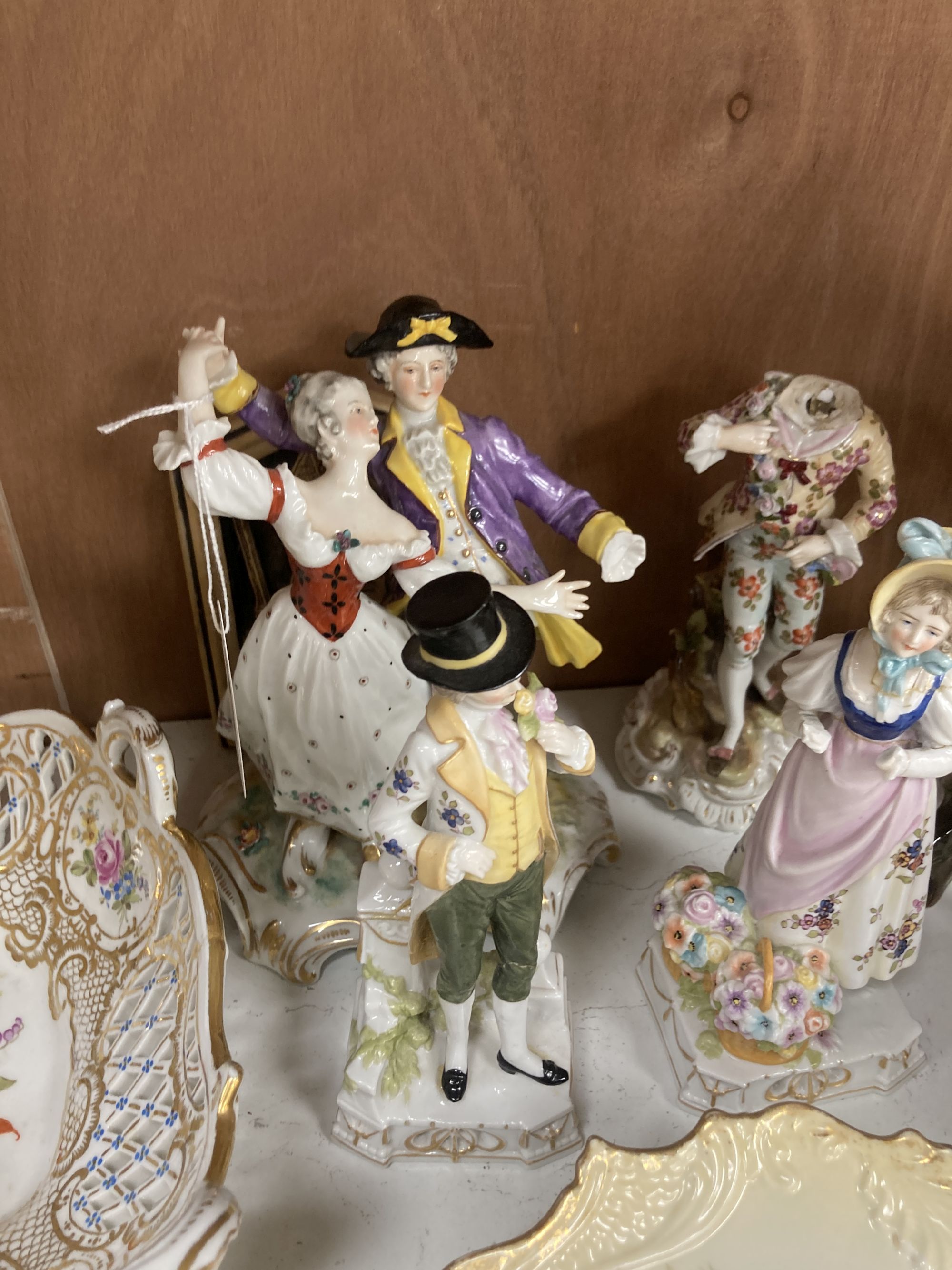 A collection of figurines, cabinet cups plates, two boxes, etc.